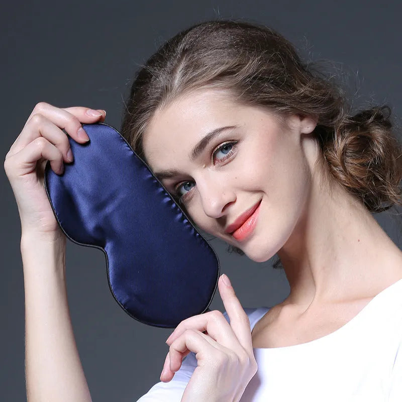Double-sided mulberry silk eye mask in a choice of 22 colours, showing embroidered print and 22x11cm size.