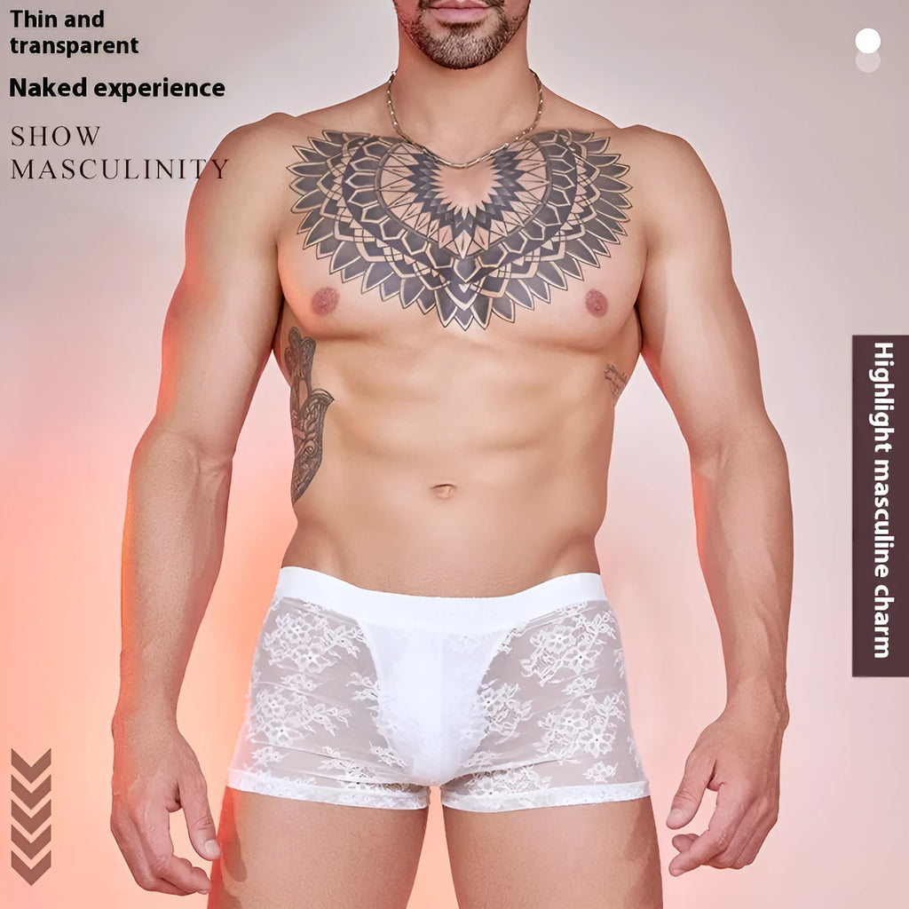 Men's black boxer briefs with white lace trim detail on a grey background.