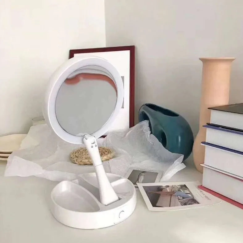 White foldable double-sided LED vanity mirror with USB charging port and storage compartments