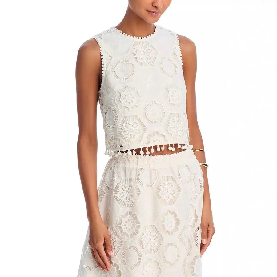White women's two-piece suit with embroidered sleeveless top and long skirt in retro art style