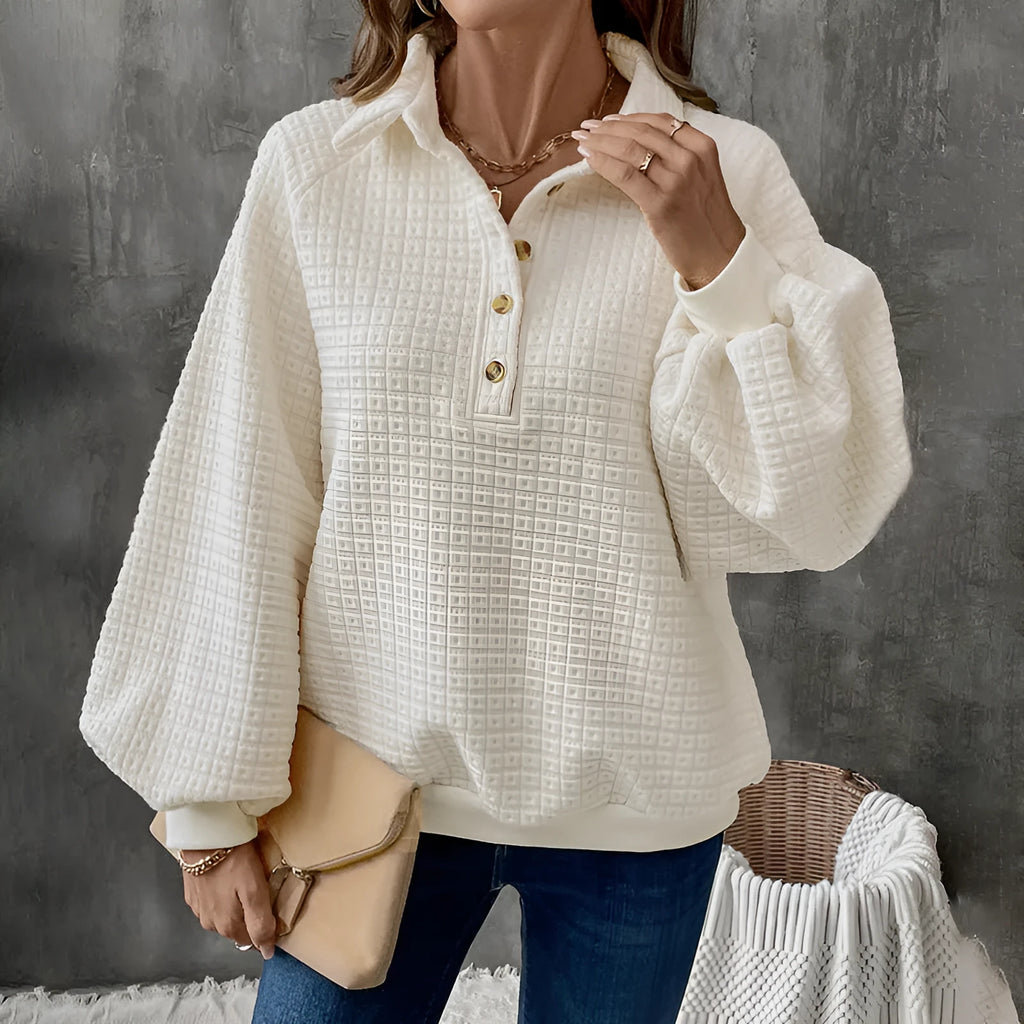 Women's beige polo neck thick polyester sweater on a hanger