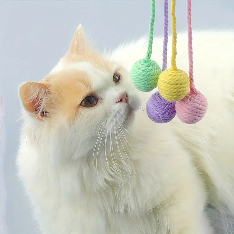 Green cat toy ball with rope and bell for kittens in 6cm and 3cm sizes