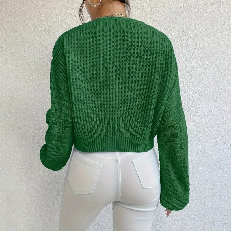 Women's long sleeve polyester pullover top in a solid colour with loose casual fit.