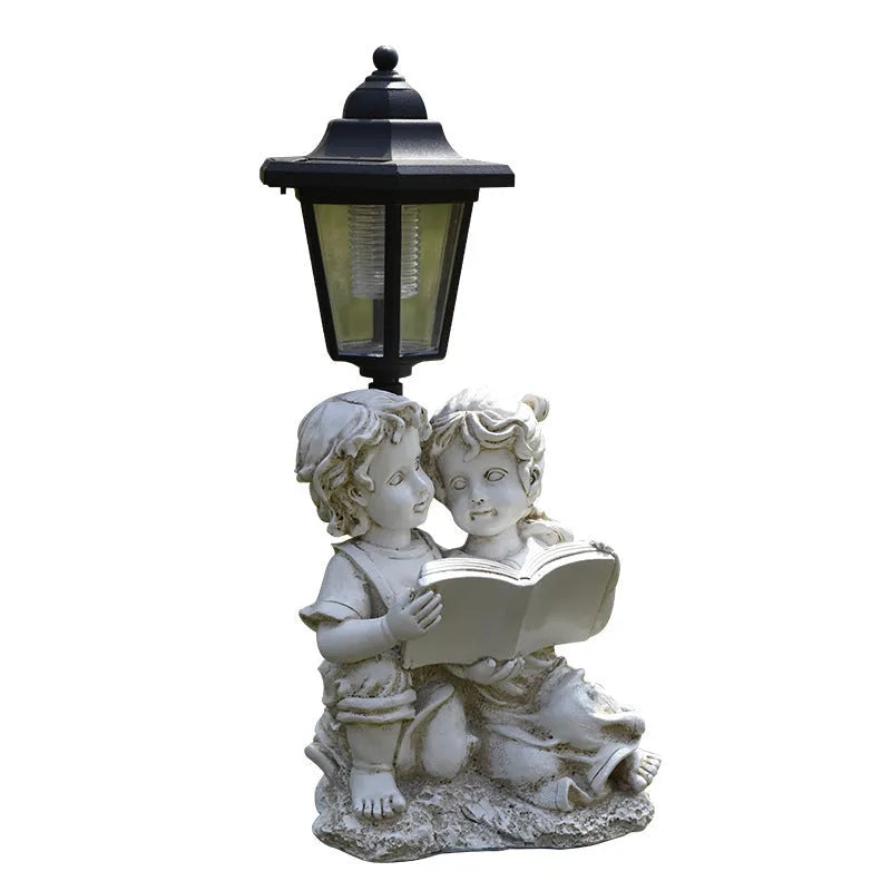 Solar hexagonal garden lamp with resin sculpture decoration in garden setting
