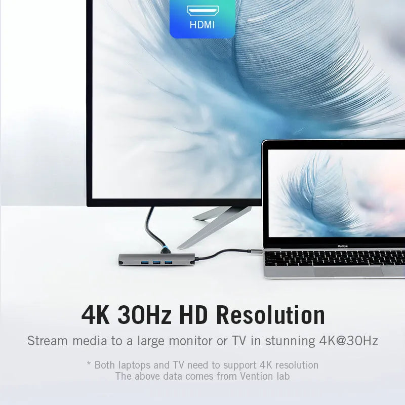 Deep grey USB-C hub with HDMI, USB 3.0, Ethernet and card reader ports showing aluminium alloy construction