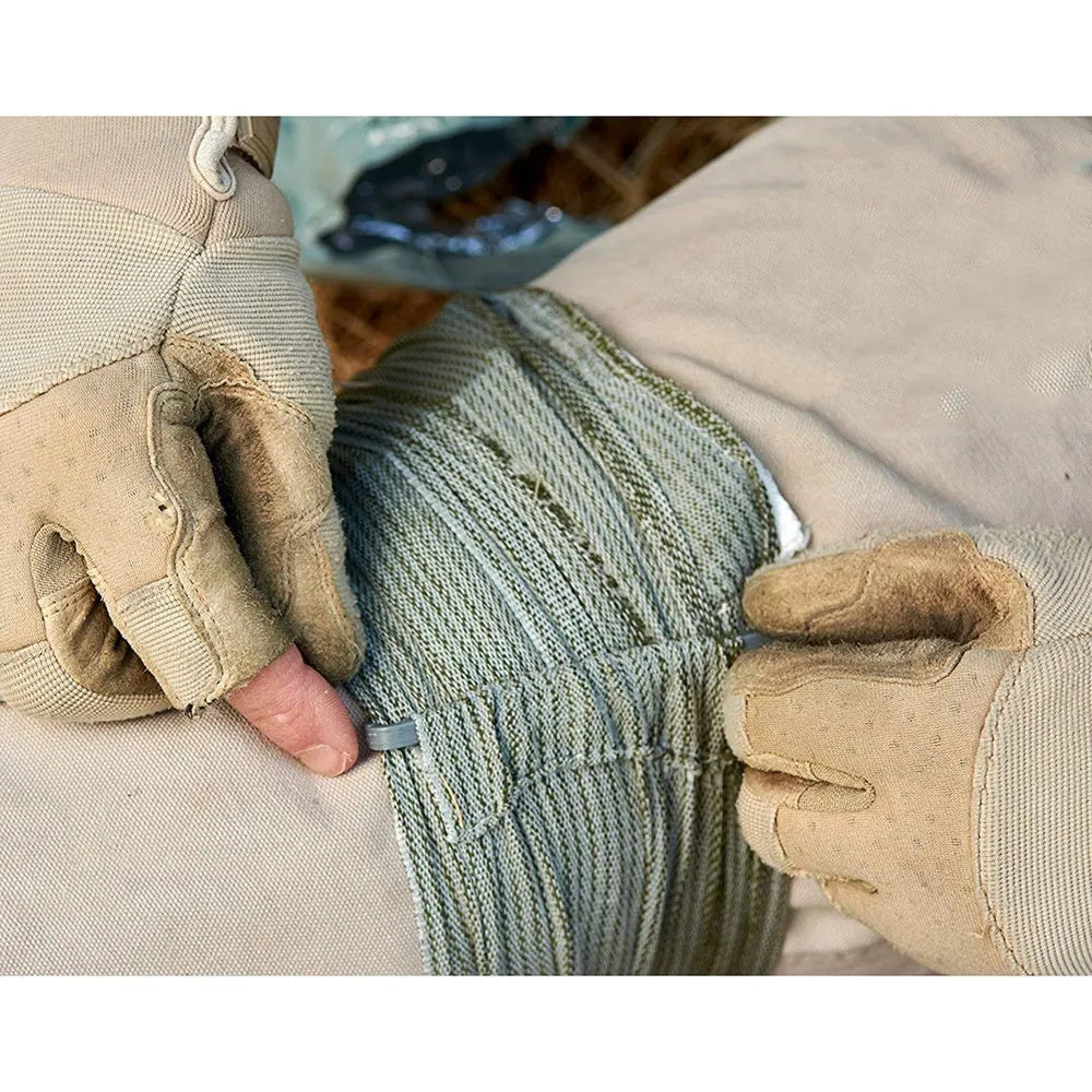 Portable outdoor hemostatic bandage kit with tactical gauze tape in compact packaging