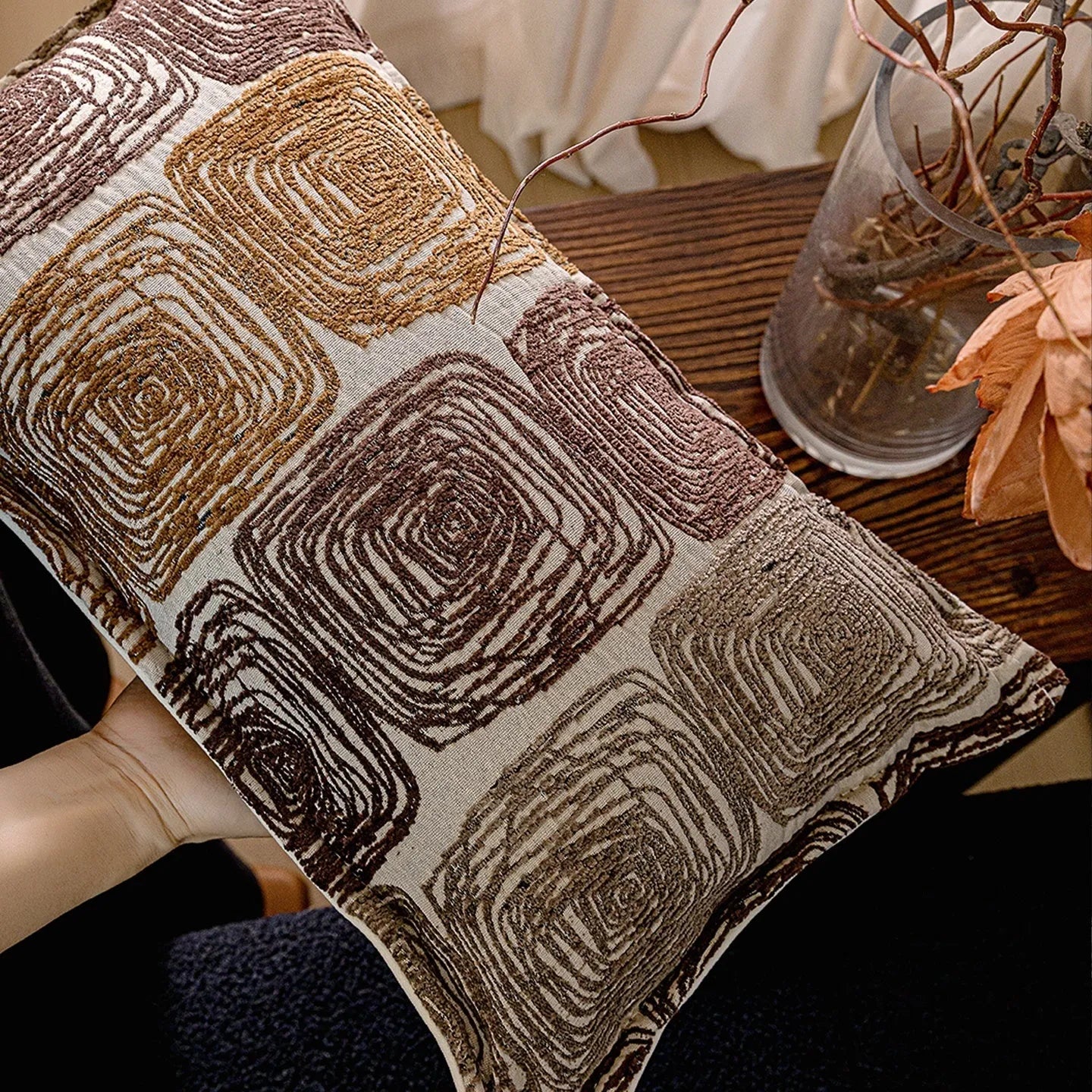 Abstract coil pattern pillow cover in cream and coffee colours showing square and rectangular dimensions