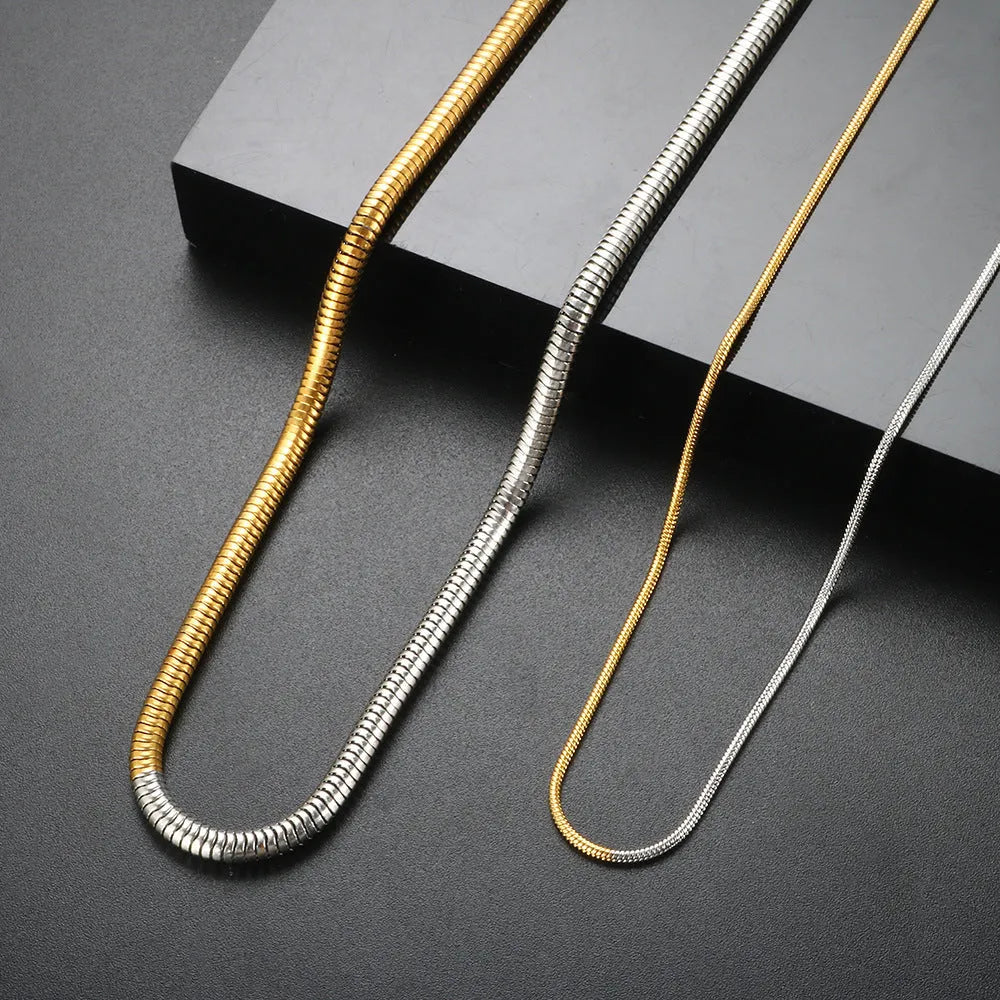 Golden snake bones chain necklace with geometric pendant for hip-hop fashion