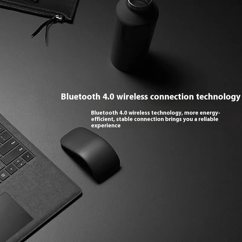 Black folding Bluetooth wireless mouse showing compact 14.5mm thickness when folded for portable laptop use