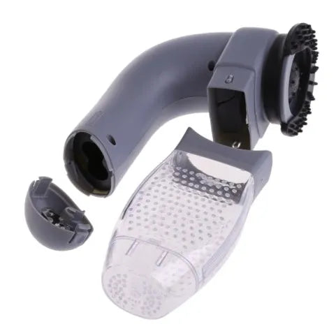 Grey handheld pet hair vacuum cleaner with soft rubber brush head for grooming dogs and cats.