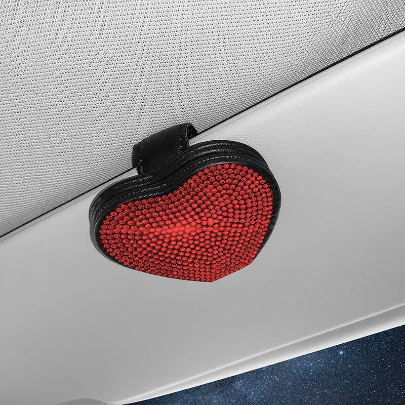 PU leather car sun visor storage clip with magnetic closure for sunglasses and cards.