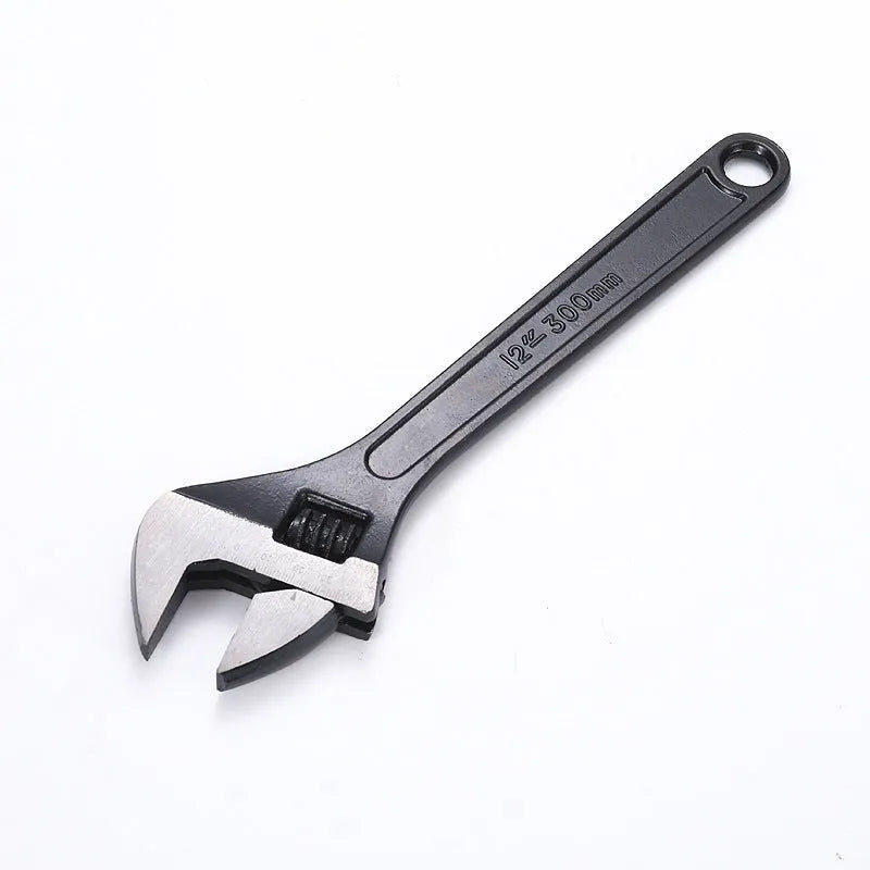 High-carbon steel adjustable spanner with black finish on a grey background.