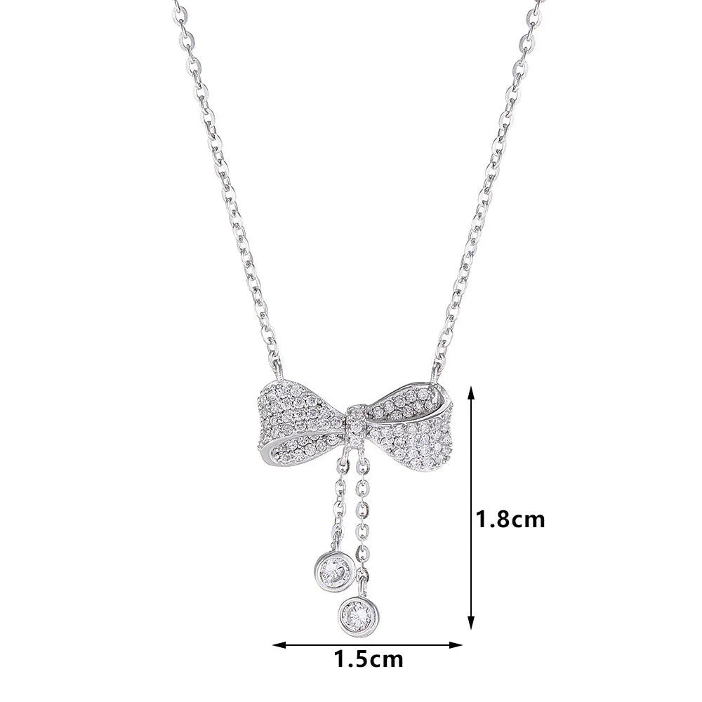 S925 sterling silver necklace with bow pendant on O-ring chain, silver colour.
