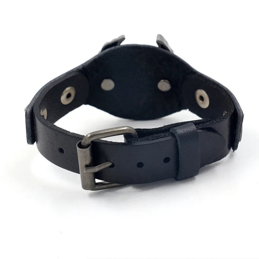Geometric black leather bracelet with alloy eagle detailing showing tapered width design