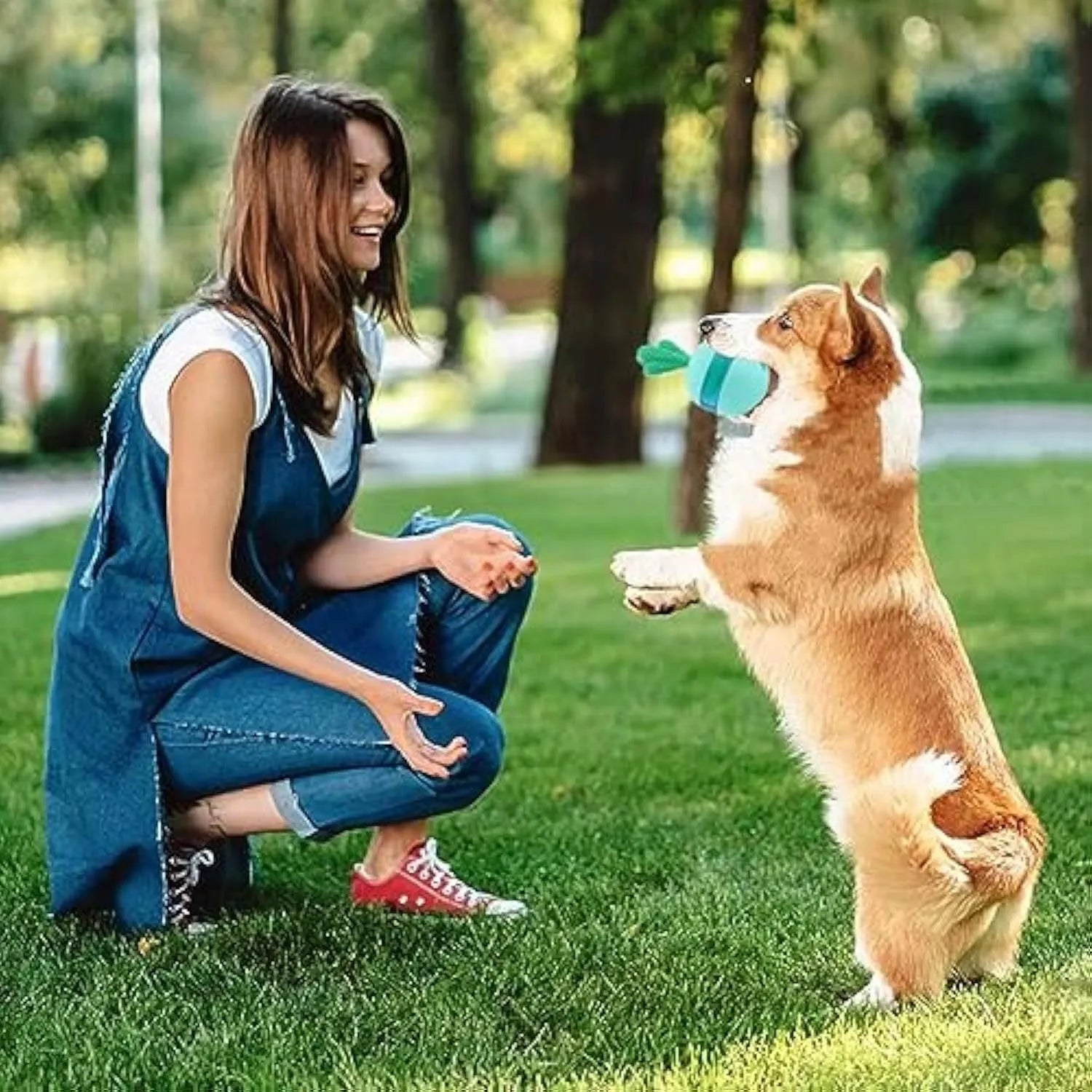 Blue durable rubber interactive dog puzzle toy ball with treat dispensing holes
