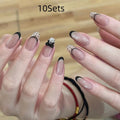 A pack of five pairs of long square-shaped false nails in assorted colours and patterns.