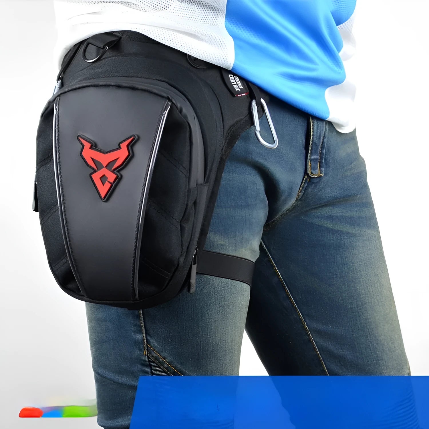 Motorcycle rider wearing a grey 1200D Oxford leg bag on their thigh.