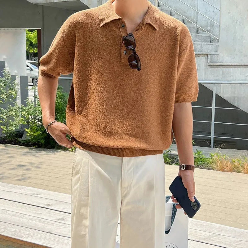 Retro style men's caramel knitted polo shirt with asymmetrical design and short sleeves.