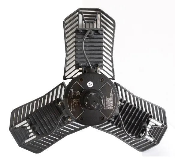 Foldable silver die-cast aluminium industrial LED lamp with a wide-angle lens for garage lighting.