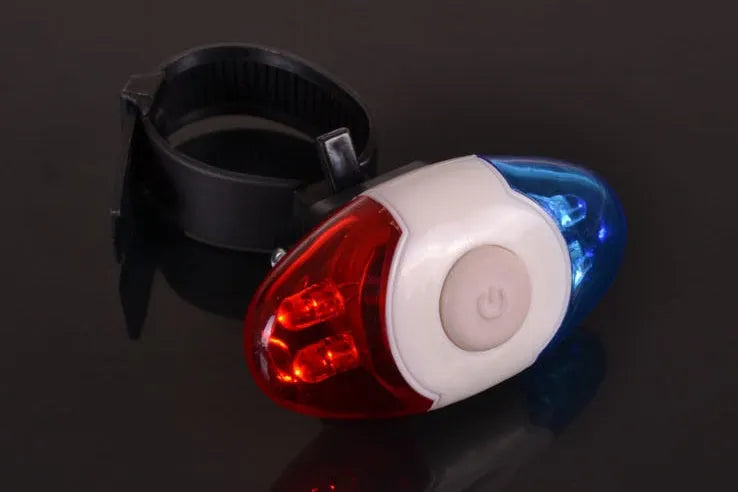 Red and blue LED bicycle tail light with adjustable mounting bracket.