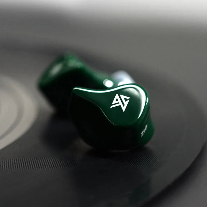 Black and Green Z1 true wireless Bluetooth in-ear headphones on a white background.