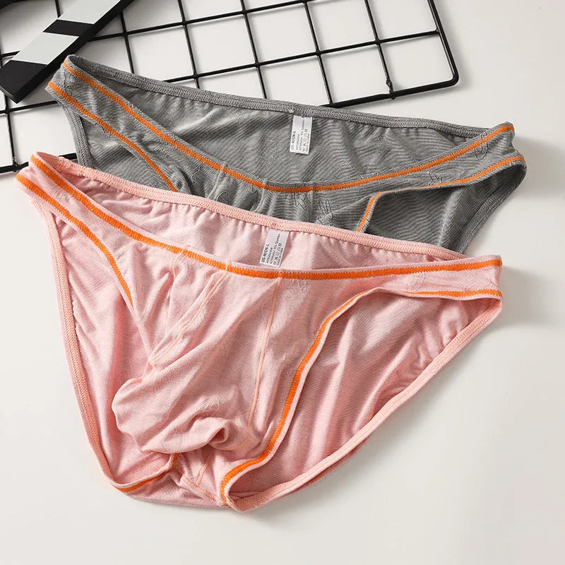 Men's modal hip lift underwear in knitted ice silk fabric showing colour options