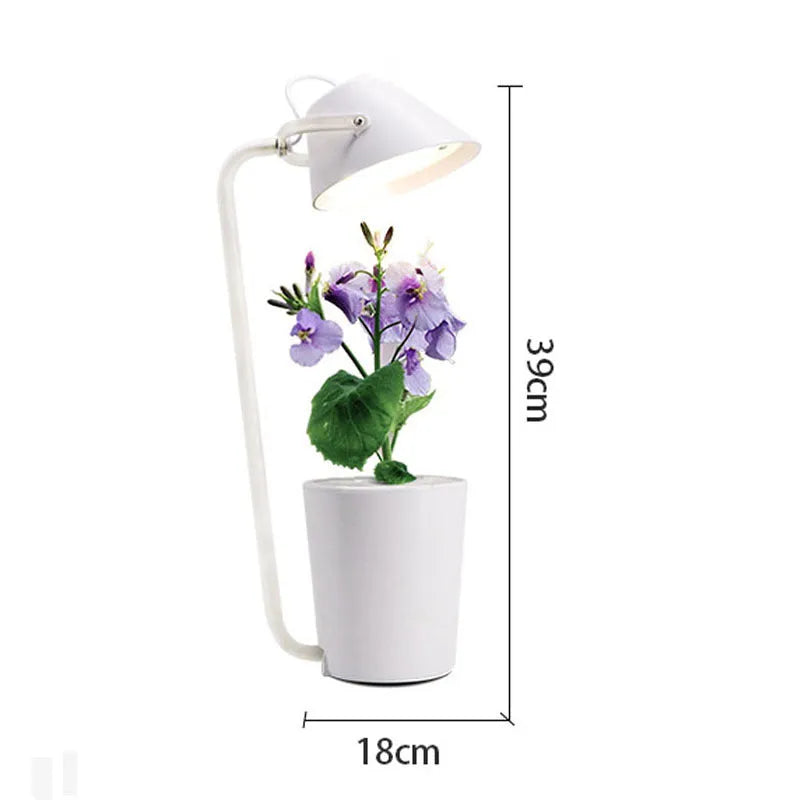 White plastic desktop hydroponic plant growth machine for soilless indoor cultivation.