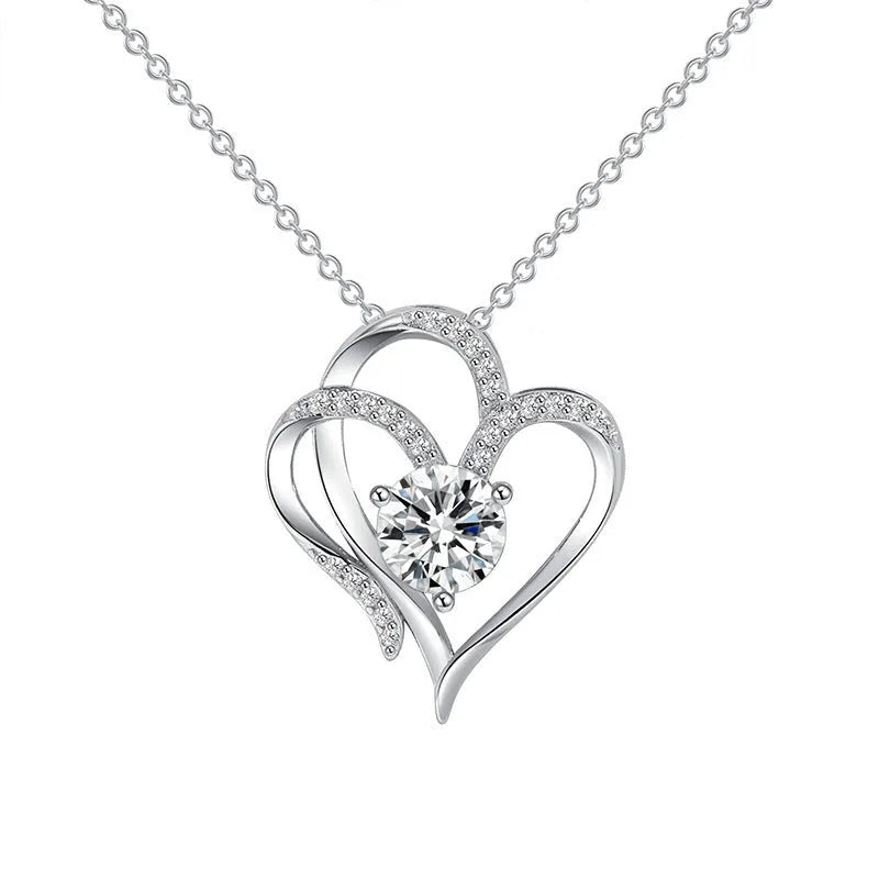 Women's sterling silver heart pendant necklace in rose gold, white gold, or yellow gold plating on a delicate chain.