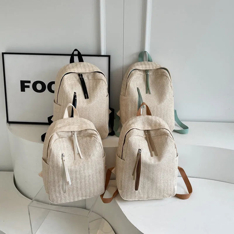 Minimalist waterproof polyester backpack for women in urban simplicity style with phone pocket