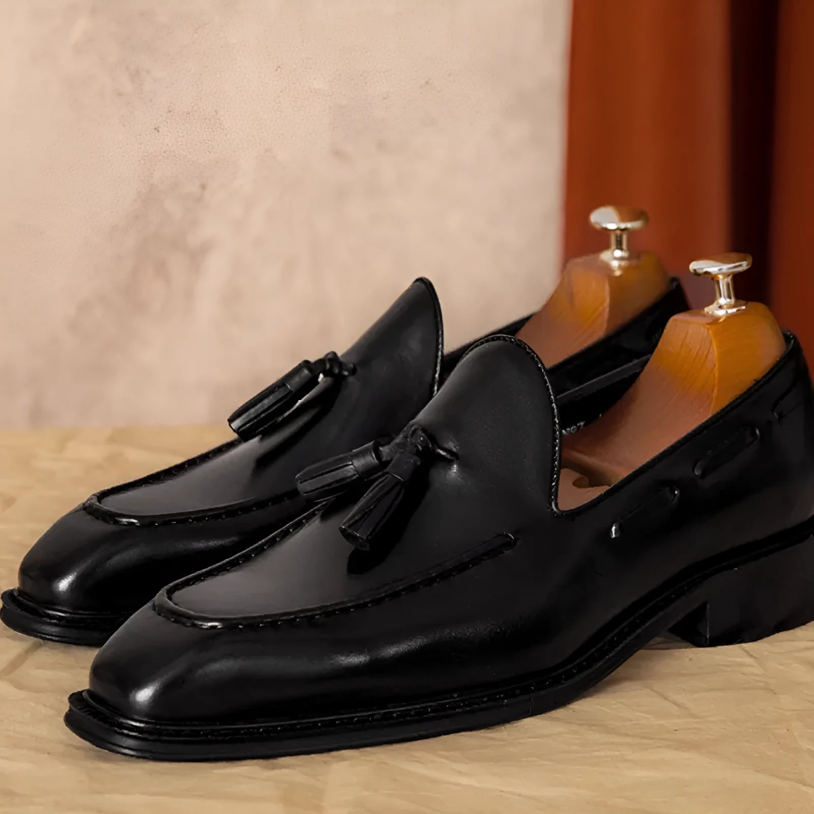Men's black genuine leather slip-on loafers with fringed British-style design