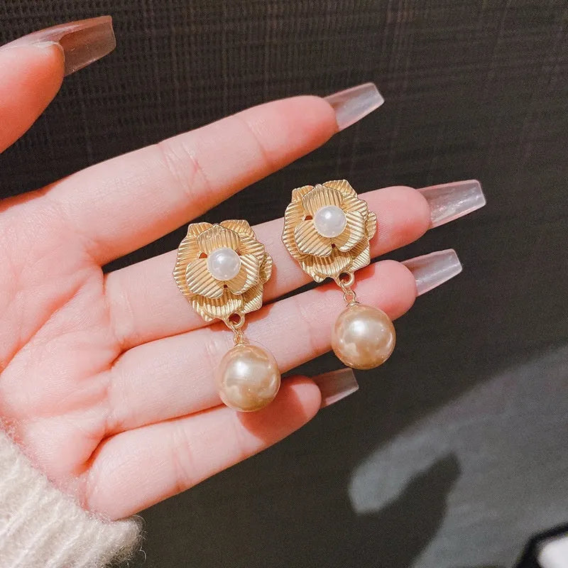 Gold coloured flower stud earrings with opal stone and ice flower design on silver electroplated alloy