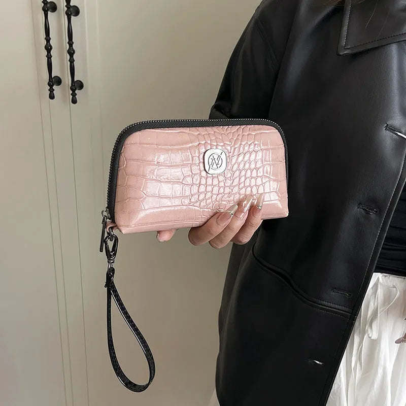 Hand-held Crystal Bamboo Pattern mobile phone bag in black, rectangular shape, 19x5x10cm, PU material, with interior pockets.