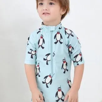 Boys' penguin print long sleeve swimsuit with matching swimming cap set