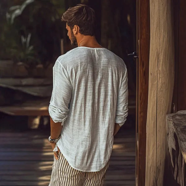 Beige V-neck long-sleeved slim fit T-shirt made from a hemp blend fabric.