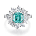 S925 sterling silver ring with an elliptical emerald and inlaid high-carbon diamonds on a geometric band.