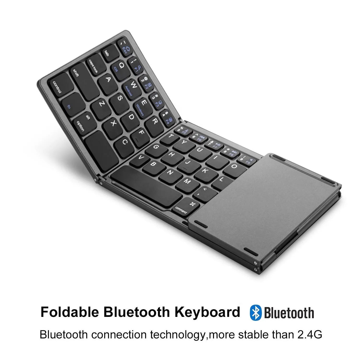 Black tri-fold Bluetooth keyboard unfolded, showing its thin profile and compact size next to a smartphone.