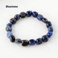 Natural amethyst large particle gravel rolling stone bracelet on a plain background showing smooth rounded beads