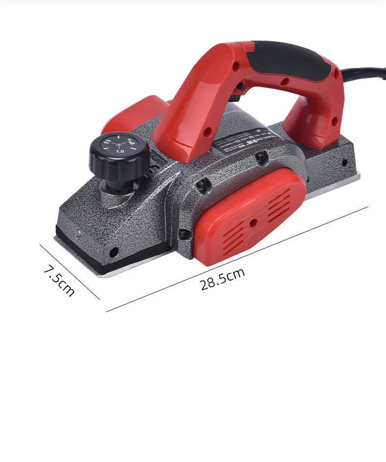 Red electric wood planer with aluminum body for carpentry and workshop use