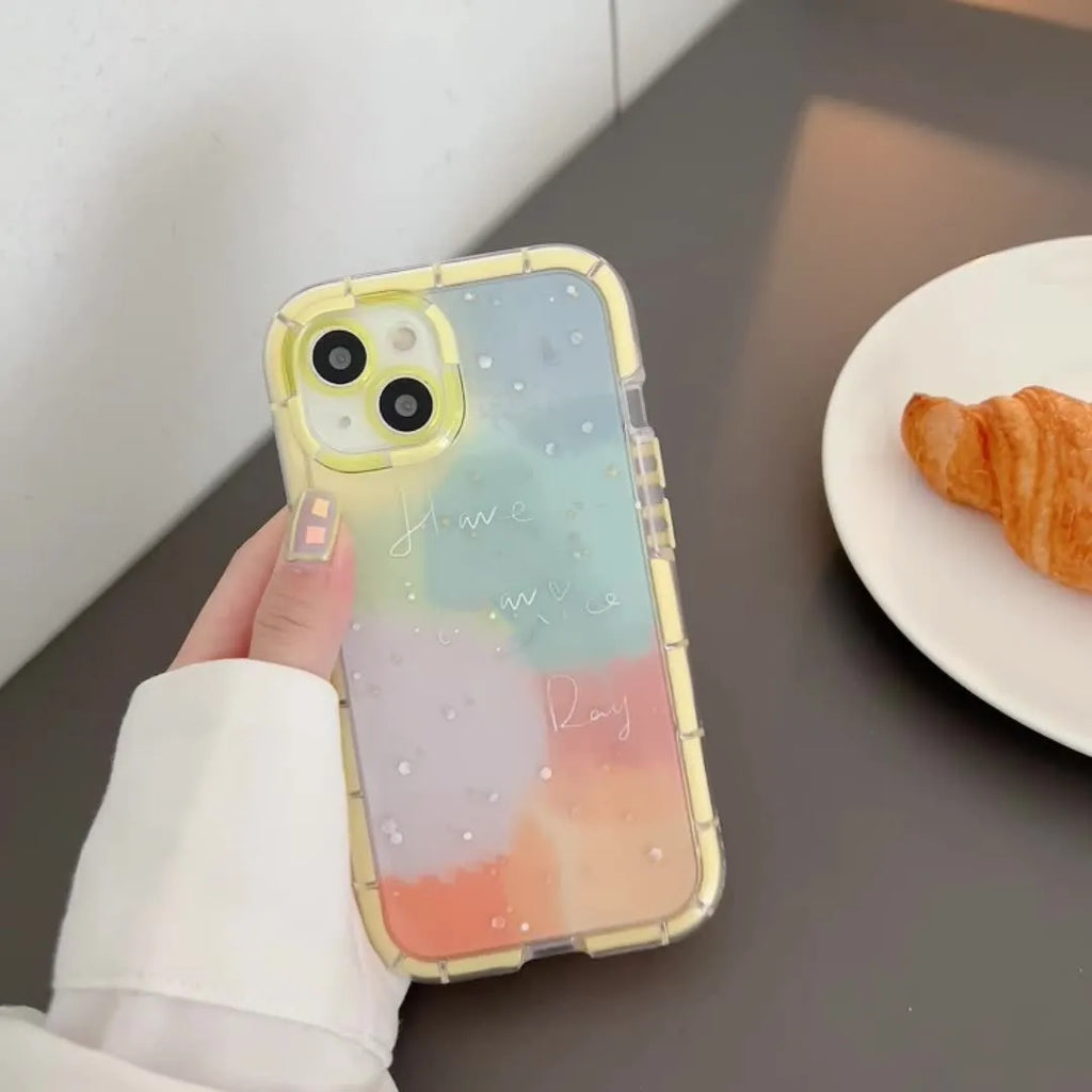 Minimalist contrast colour iPhone silicone case with yellow edge trim shown on iPhone 14 Pro Max