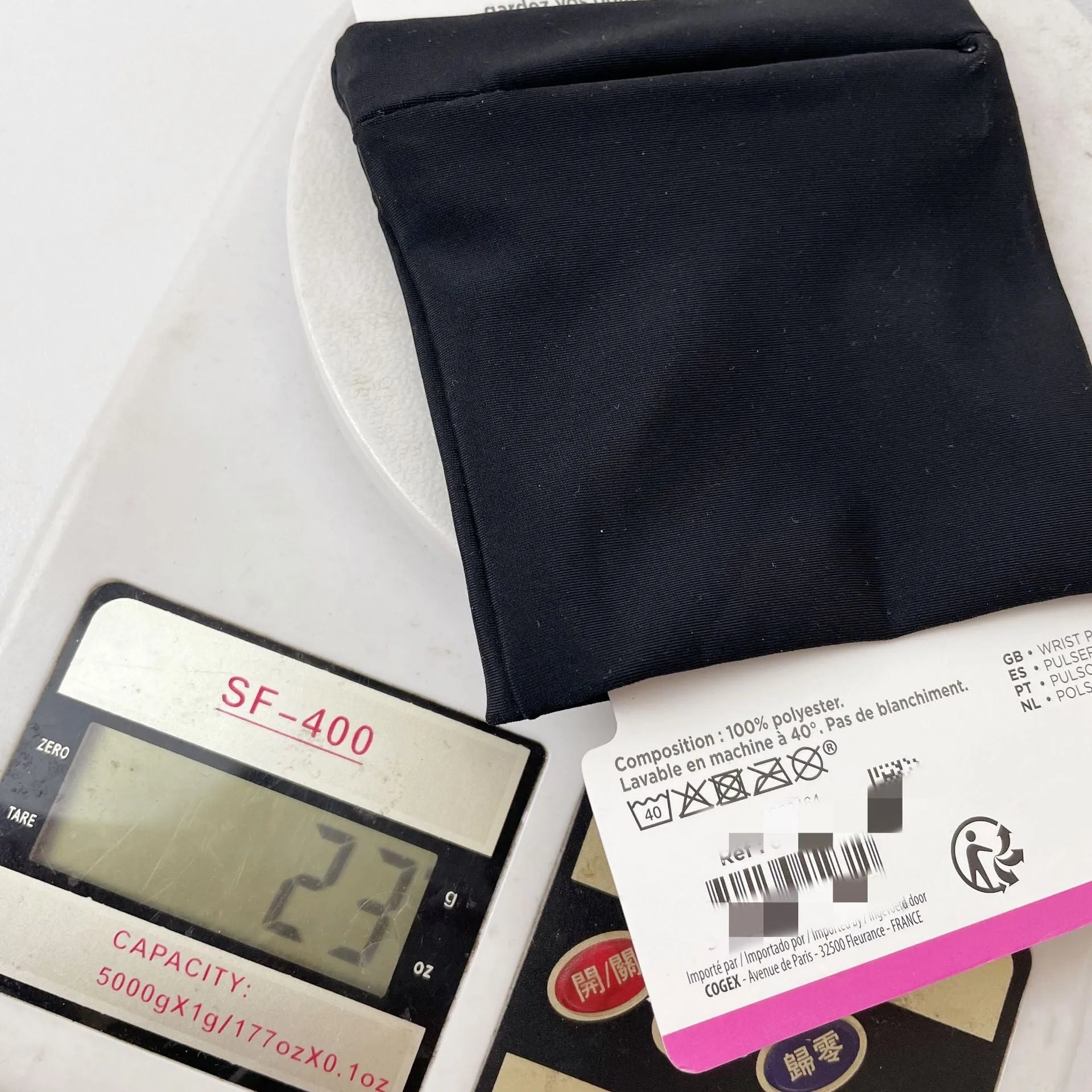 Wrist bag armband sleeve measuring 10cm by 10.5cm with water-resistant OPP packaging
