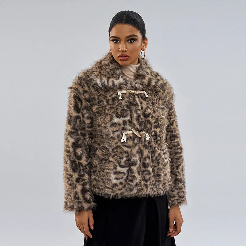 Women's leopard print polyester coat with buckle lapel detail showing regular sleeves and mid-length design