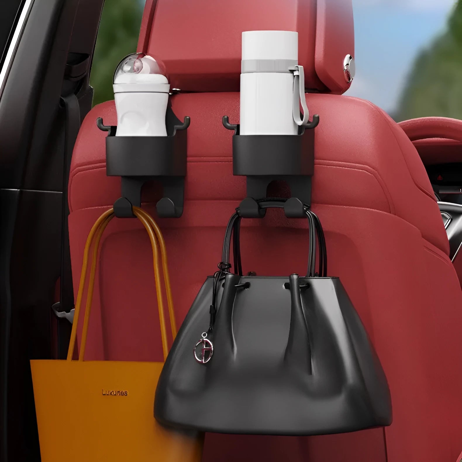 Black plastic car hook seat back organiser with cup holder and hooks for vehicle storage