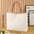 Heavyweight cotton canvas tote bag in beige white and white colour options.