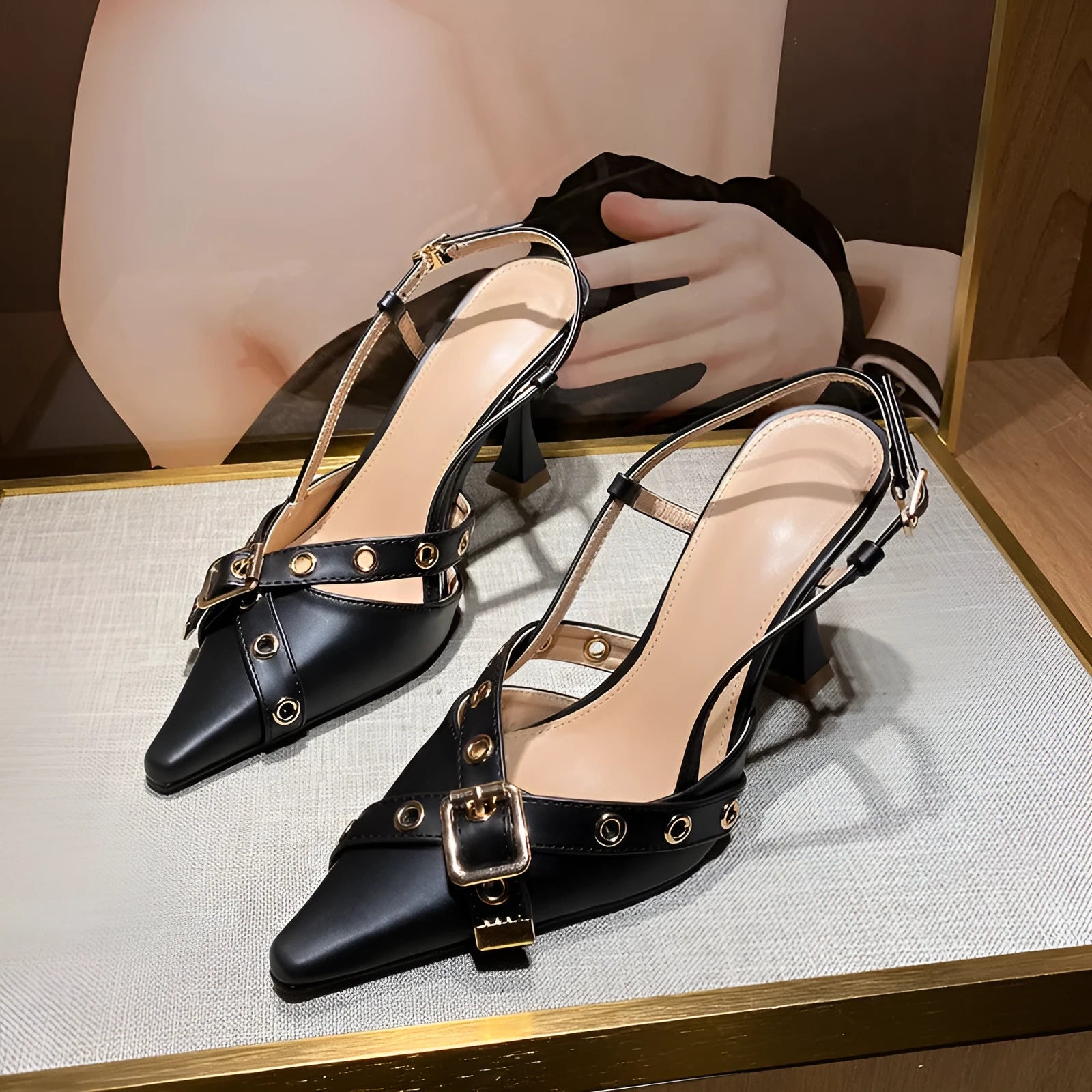 Women's mid heel patent leather pointed toe buckle sandals in Black and Caramel with cross strap
