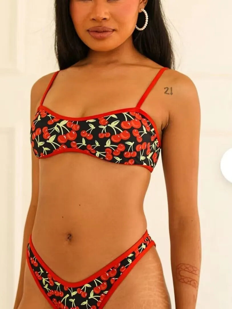 Women's cherry print floral tube top bikini swimsuit in polyester fabric.
