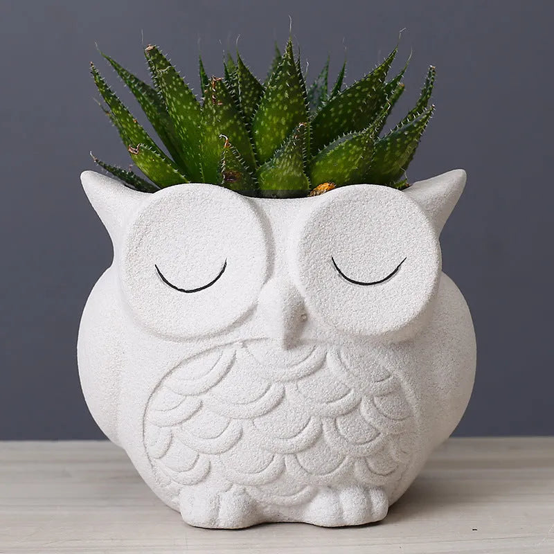 Handmade frosted ceramic owl design succulent flower pot in light pink colour.