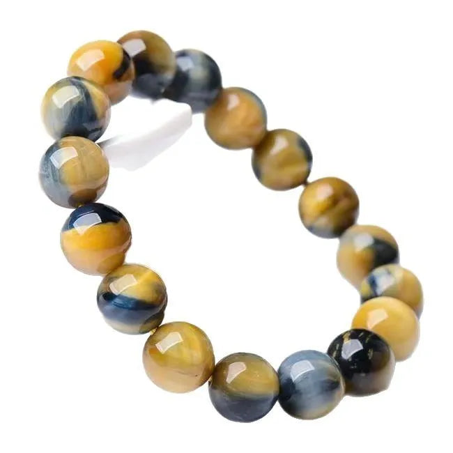 Handmade fantasy tiger eye agate unisex bracelet with round beads in 8mm, 10mm or 12mm sizes.