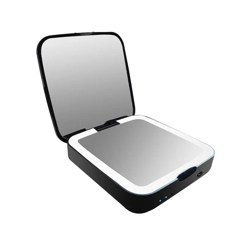 Black and white LED makeup mirror showing standard and 4x magnification sides with adjustable lighting.