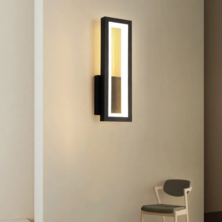 Modern Nordic style corridor wall light with PVC shade in black, available in two length sizes.