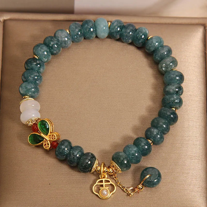 Women's blue water jade abacus bead bracelet with alloy inlay and butterfly charms